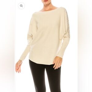 Chic Cream Turtleneck Sweater with Embellished Sleeves